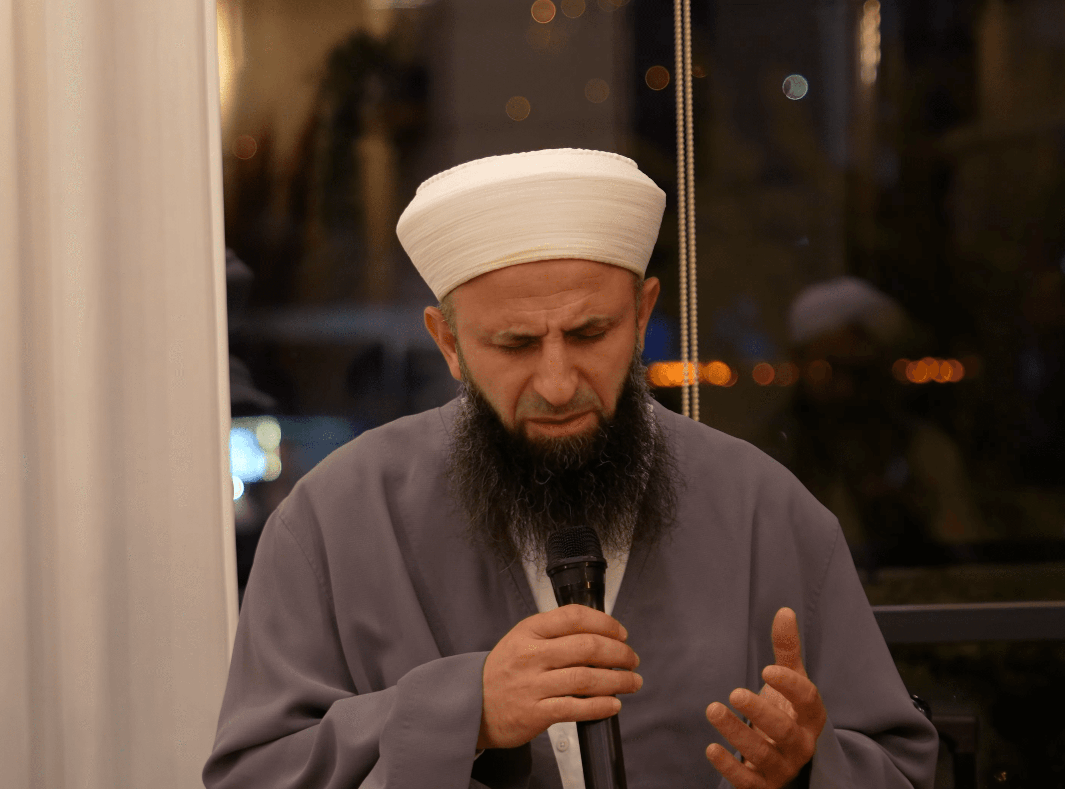 A scholar of Al-Sharaf reciting the khutbah of nikah